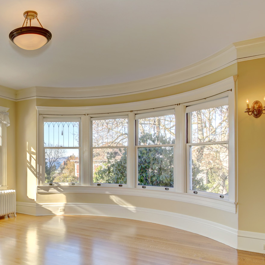 Curved wall with 4 windows and baseboard ValuFlex moulding