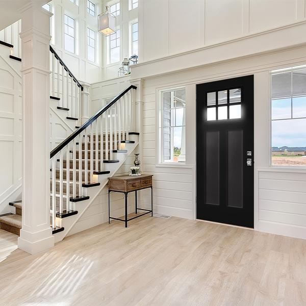 Craftsman style home entryway with a Heritage Series 2 panel black door