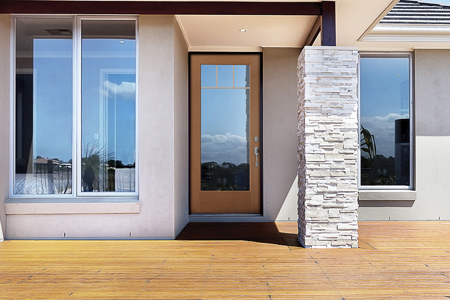 Modern home walkway with flush glazed door