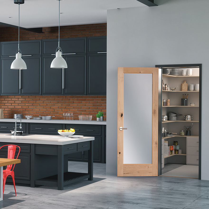 Modern style kitchen with an interior full lite clear glass Knotty Alder door used for a pantry door