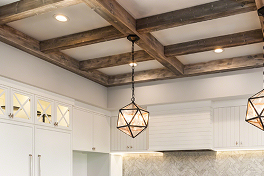Kitchen with exposed polyurethane wood grained beams on the ceiling