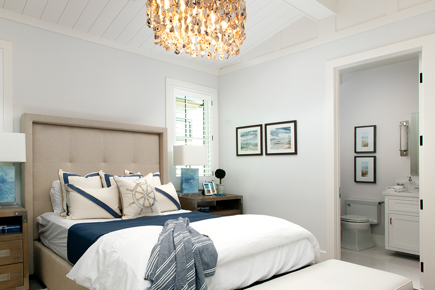 Coastal style bedroom with bathroom 